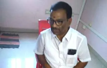 motor vehicle inspector arrested